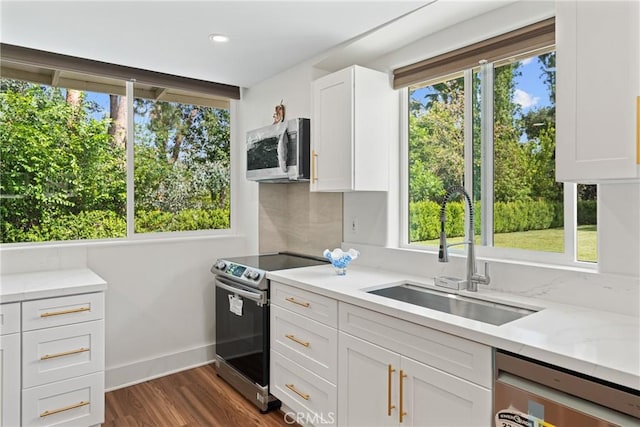 1377 Knoll Rd, Redlands, CA 92373 - kitchen featuring stainless steel appliances, white cabinetry, plenty of natural light, dark wood finished floors, and recessed lighting