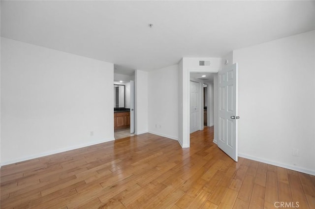 1995 Las Colinas Cir Unit 301, Corona, CA 92879 - unfurnished room featuring light wood-style floors and baseboards