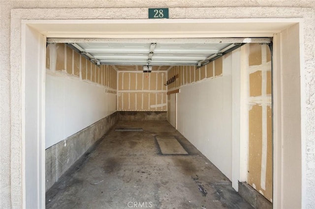 1995 Las Colinas Cir Unit 301, Corona, CA 92879 - garage with a garage door opener