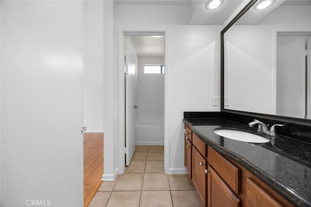1995 Las Colinas Cir Unit 301, Corona, CA 92879 - bathroom featuring vanity, tile patterned floors, and a tub