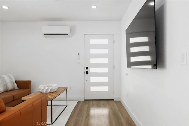 2129 N Pepper St, Burbank, CA 91505 - entrance foyer featuring a wall mounted air conditioner, light wood-style floors, recessed lighting, and baseboards