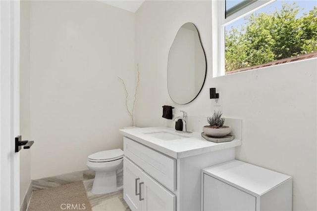 2129 N Pepper St, Burbank, CA 91505 - bathroom featuring vanity, toilet, and marble finish flooring