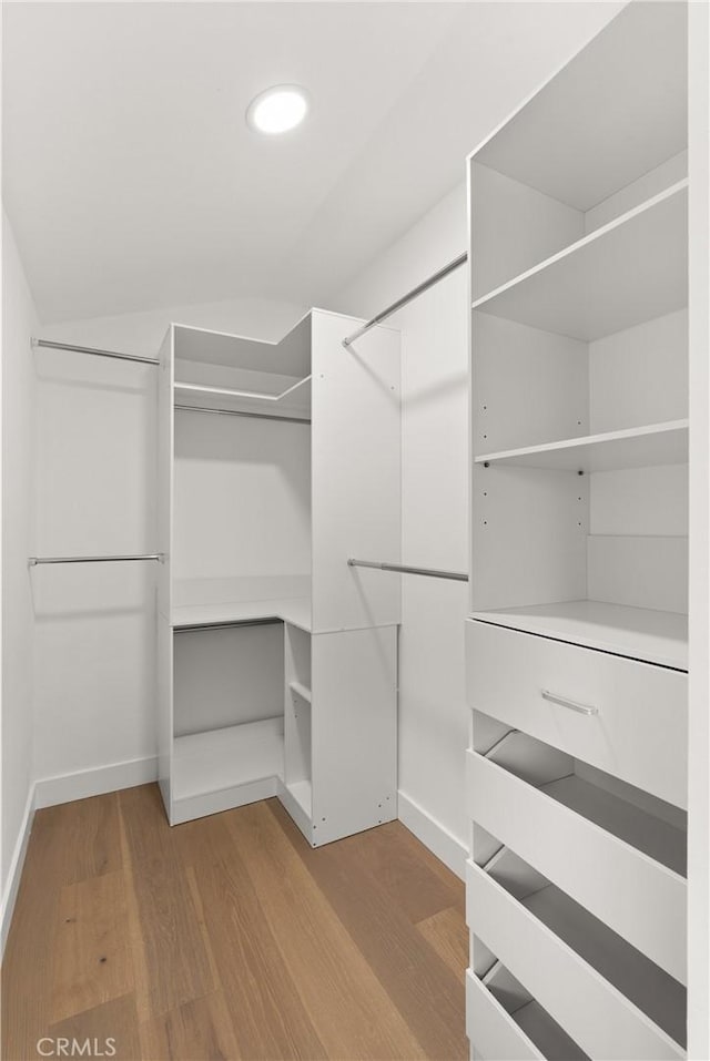 2796 Cibola Ave, Costa Mesa, CA 92626 - walk in closet featuring wood finished floors and lofted ceiling