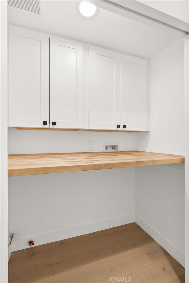 2796 Cibola Ave, Costa Mesa, CA 92626 - interior space with light wood-type flooring, baseboards, and built in desk