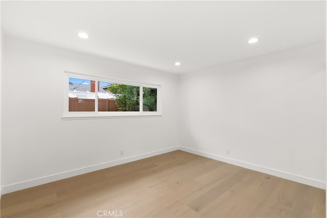 2796 Cibola Ave, Costa Mesa, CA 92626 - empty room featuring light wood-style flooring, recessed lighting, and baseboards