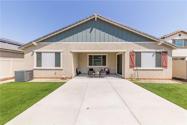 29485 Whitewood St, Menifee, CA 92584 - view of front of home with a patio, stucco siding, and board and batten siding