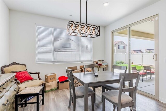 29485 Whitewood St, Menifee, CA 92584 - dining room featuring light wood-type flooring and recessed lighting