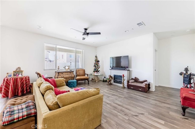 29485 Whitewood St, Menifee, CA 92584 - living room with a ceiling fan, light wood-type flooring, and recessed lighting