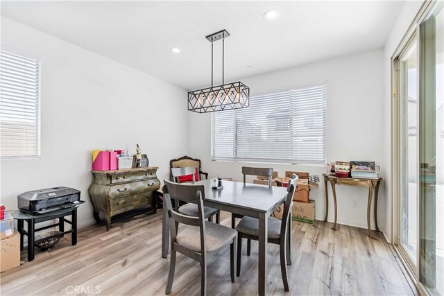 29485 Whitewood St, Menifee, CA 92584 - dining area with healthy amount of natural light, light wood finished floors, and recessed lighting