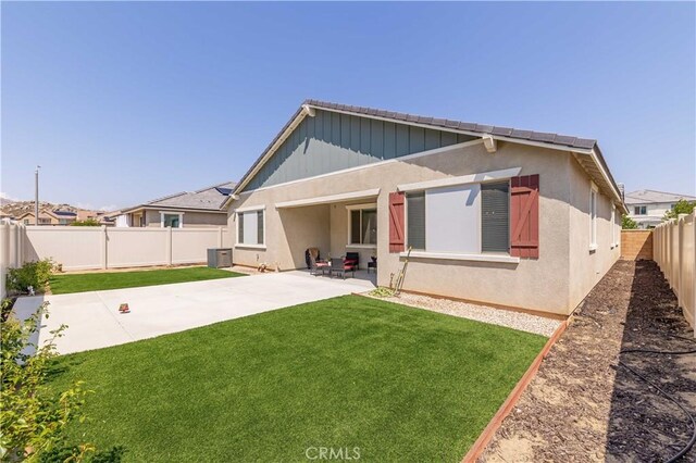 29485 Whitewood St, Menifee, CA 92584 - back of house with a patio, a fenced backyard, and stucco siding