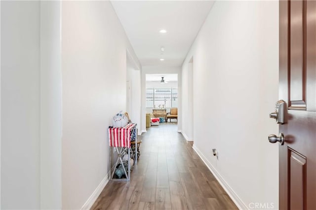 29485 Whitewood St, Menifee, CA 92584 - hallway featuring wood finished floors and recessed lighting