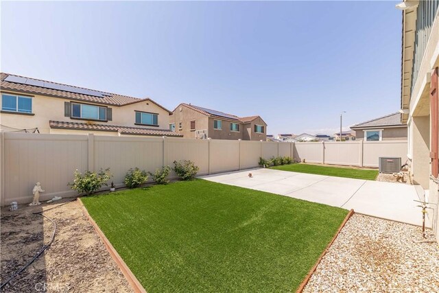29485 Whitewood St, Menifee, CA 92584 - fenced backyard with a patio area and a residential view