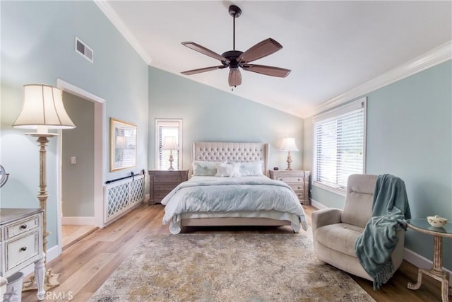 425 Old Ranch Rd, Seal Beach, CA 90740 - bedroom featuring crown molding, baseboards, vaulted ceiling, light wood-style flooring, and ceiling fan
