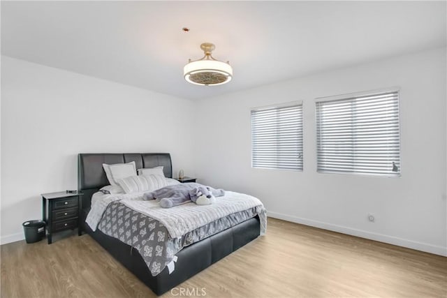 330 California St Unit F, Arcadia, CA 91006 - bedroom featuring baseboards and light wood finished floors