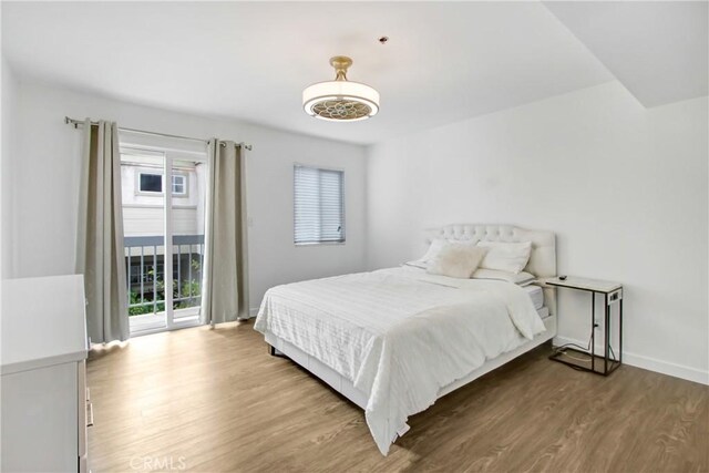 330 California St Unit F, Arcadia, CA 91006 - bedroom with wood finished floors and access to exterior
