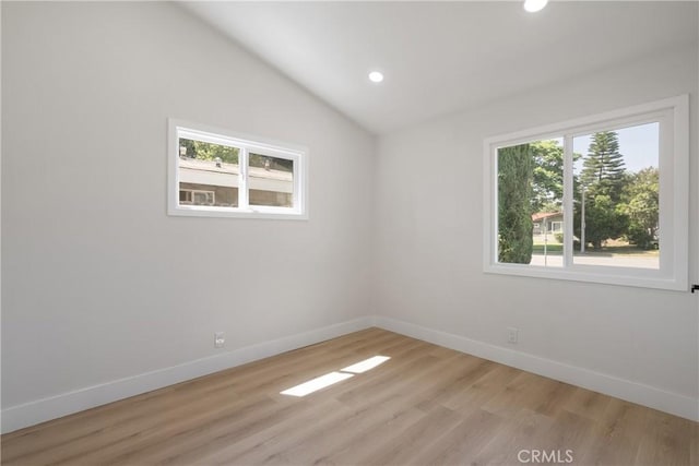 1994 11th St, La Verne, CA 91750 - unfurnished room featuring light wood-type flooring, recessed lighting, and vaulted ceiling