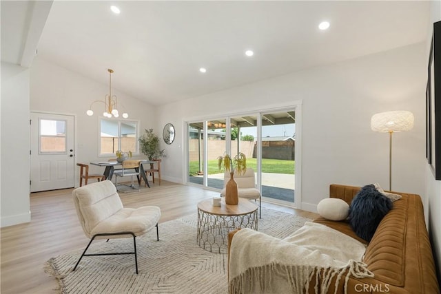 1994 11th St, La Verne, CA 91750 - living room featuring a chandelier, recessed lighting, light wood-style floors, and high vaulted ceiling