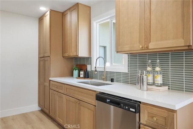1994 11th St, La Verne, CA 91750 - kitchen with dishwasher, tasteful backsplash, light wood finished floors, light countertops, and recessed lighting