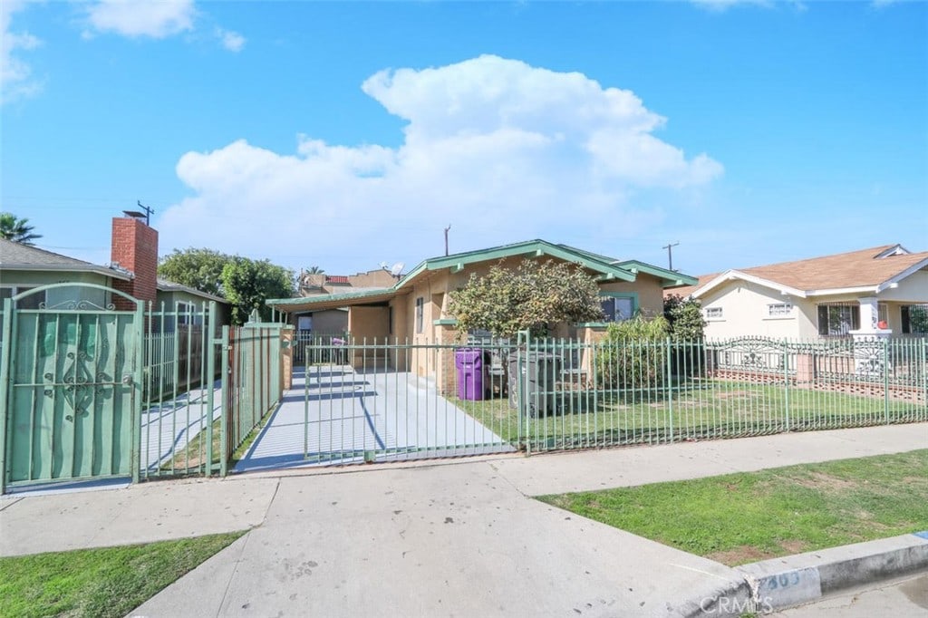 1403 Lemon Ave, Long Beach, CA 90813 - view of front of property featuring a gate and stucco siding