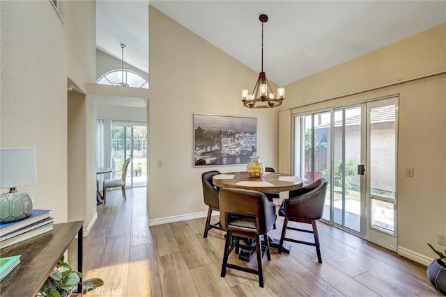 41555 Avenida De La Reina, Temecula, CA 92592 - dining room featuring a chandelier, wood finished floors, and high vaulted ceiling