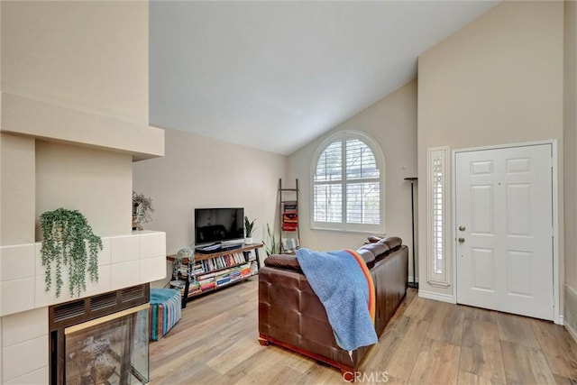 41555 Avenida De La Reina, Temecula, CA 92592 - living area with vaulted ceiling and light wood-type flooring