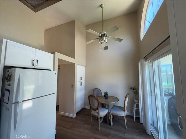 41555 Avenida De La Reina, Temecula, CA 92592 - dining space featuring high vaulted ceiling, dark wood-style floors, and a ceiling fan