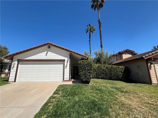 41555 Avenida De La Reina, Temecula, CA 92592 - single story home featuring a front yard, concrete driveway, a tile roof, and a garage