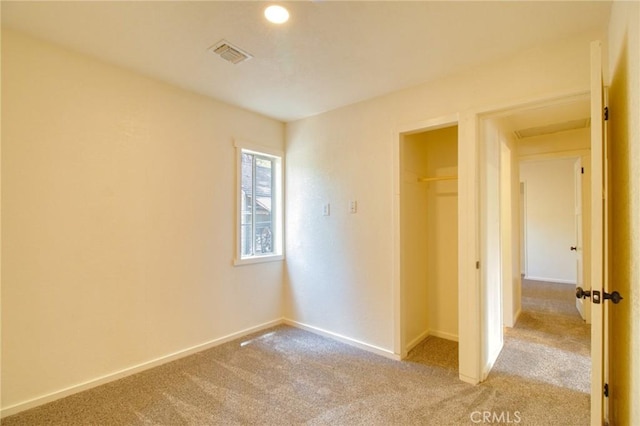 1131 Apple Ave, Wrightwood, CA 92397 - unfurnished bedroom featuring light colored carpet and a closet