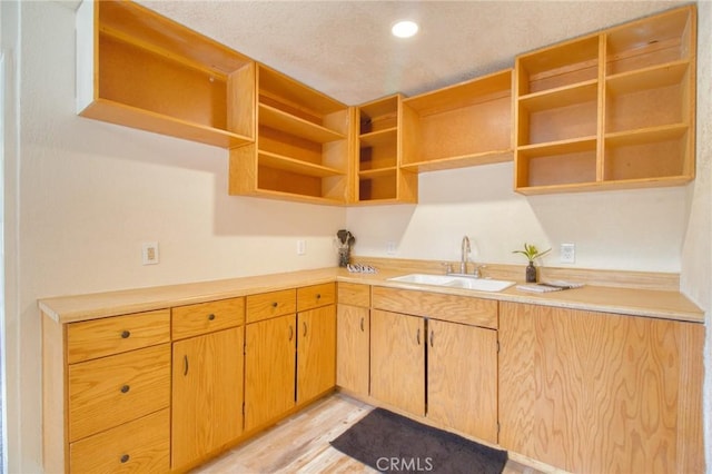 1131 Apple Ave, Wrightwood, CA 92397 - kitchen with open shelves, light countertops, light wood finished floors, and recessed lighting