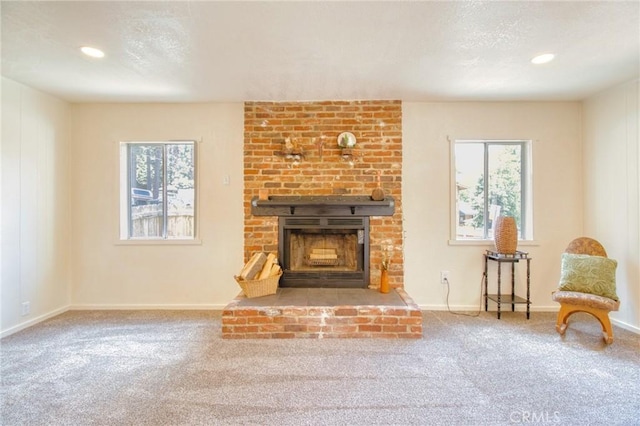 1131 Apple Ave, Wrightwood, CA 92397 - living room with carpet floors, healthy amount of natural light, a brick fireplace, and recessed lighting