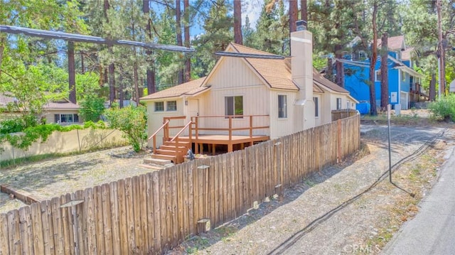 1131 Apple Ave, Wrightwood, CA 92397 - view of front of home featuring a deck and a chimney