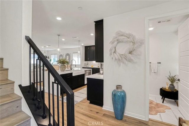 27723 S Grandview Way, San Pedro, CA 90732 - stairs featuring recessed lighting and wood finished floors