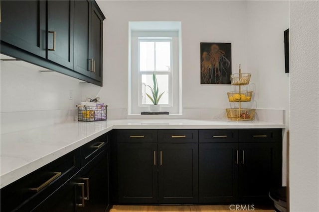 27723 S Grandview Way, San Pedro, CA 90732 - kitchen with dark cabinets and light stone countertops