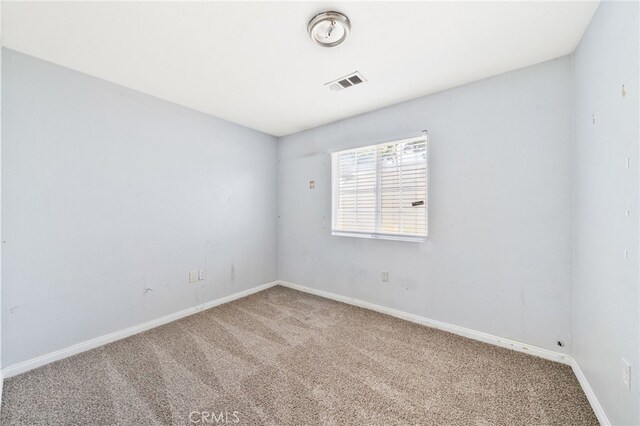5294 Yosemite Dr, San Bernardino, CA 92407 - carpeted empty room featuring baseboards