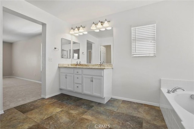 31713 Pompei Ln, Winchester, CA 92596 - full bathroom featuring double vanity, a bath, and stone finish flooring
