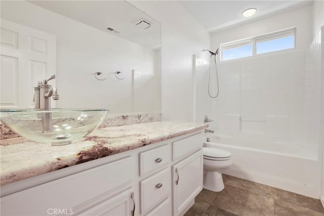 31713 Pompei Ln, Winchester, CA 92596 - bathroom featuring vanity, shower / bathtub combination, and stone finish flooring