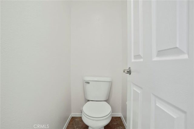 31713 Pompei Ln, Winchester, CA 92596 - bathroom featuring baseboards and toilet