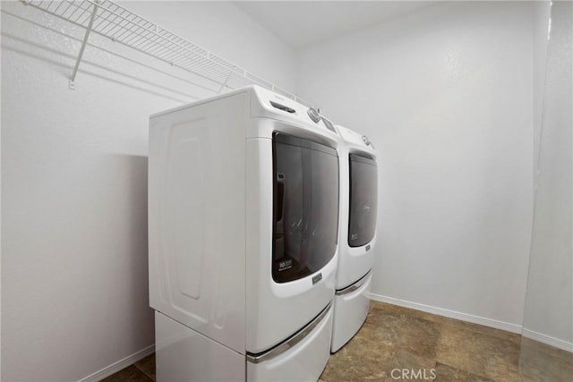31713 Pompei Ln, Winchester, CA 92596 - laundry room featuring washing machine and dryer and baseboards