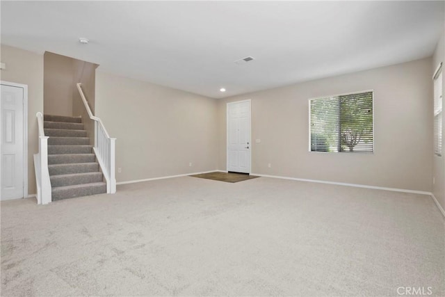 31713 Pompei Ln, Winchester, CA 92596 - unfurnished living room featuring carpet, stairway, and recessed lighting
