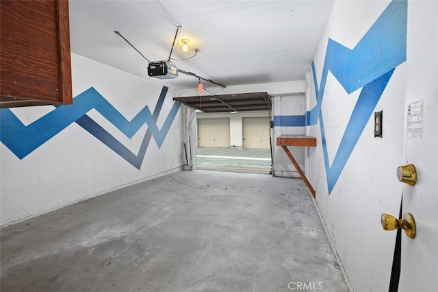 12562 Montecito Rd Unit 3, Seal Beach, CA 90740 - garage featuring a garage door opener