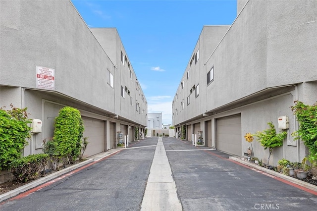 12562 Montecito Rd Unit 3, Seal Beach, CA 90740 - view of asphalt alley