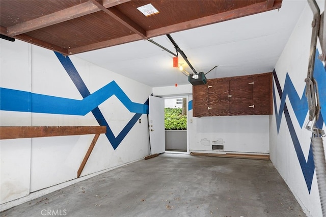 12562 Montecito Rd Unit 3, Seal Beach, CA 90740 - garage featuring a garage door opener