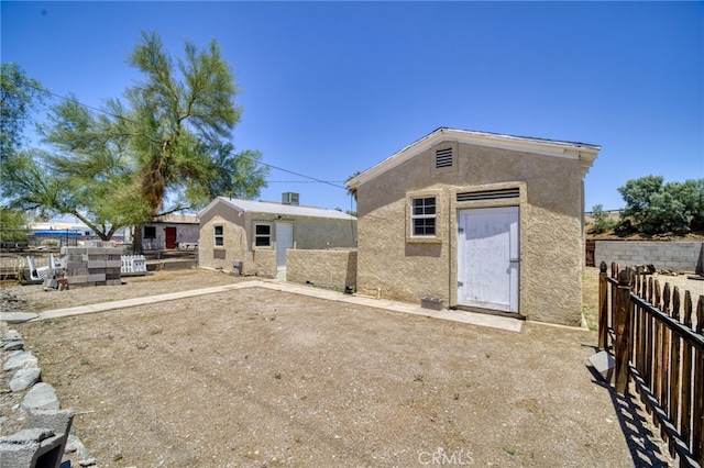 503 California Ave, Needles, CA 92363 - back of house featuring stucco siding