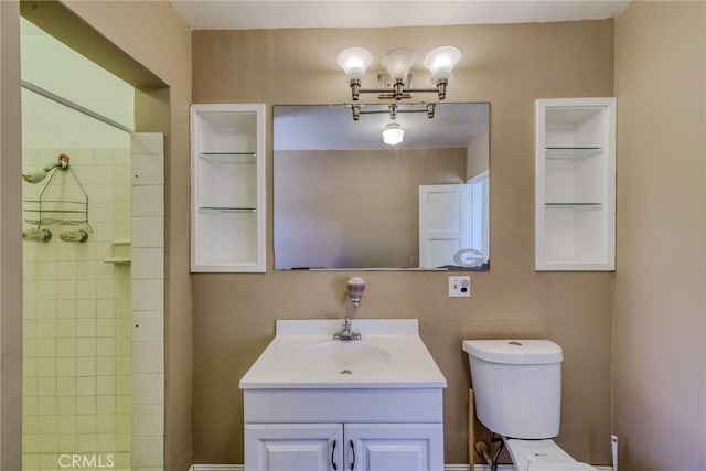 503 California Ave, Needles, CA 92363 - full bathroom featuring toilet, vanity, tiled shower, and a chandelier