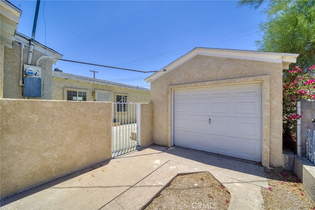 503 California Ave, Needles, CA 92363 - detached garage featuring a gate