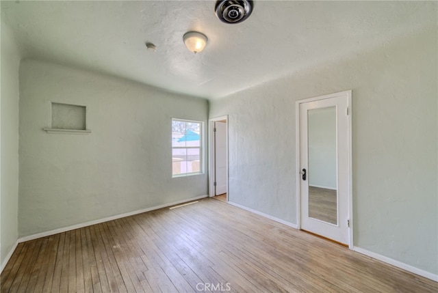 503 California Ave, Needles, CA 92363 - spare room featuring wood-type flooring and baseboards