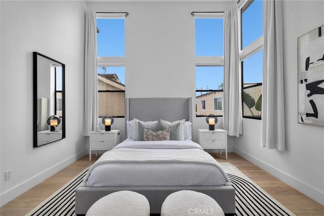 2004 Grant Ave Unit B, Redondo Beach, CA 90278 - bedroom with multiple windows and light wood-style flooring