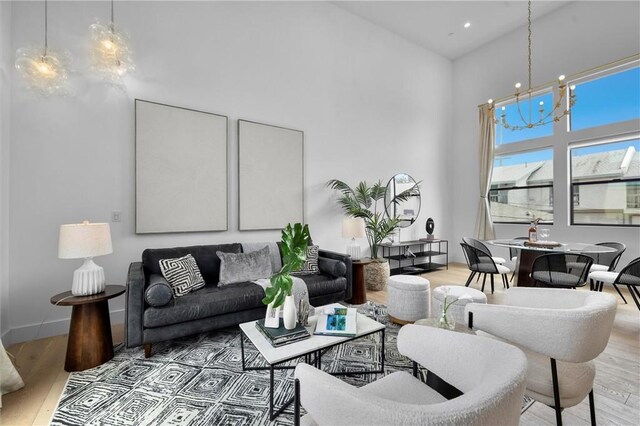 2004 Grant Ave Unit B, Redondo Beach, CA 90278 - living area with a high ceiling, light wood finished floors, a chandelier, and recessed lighting