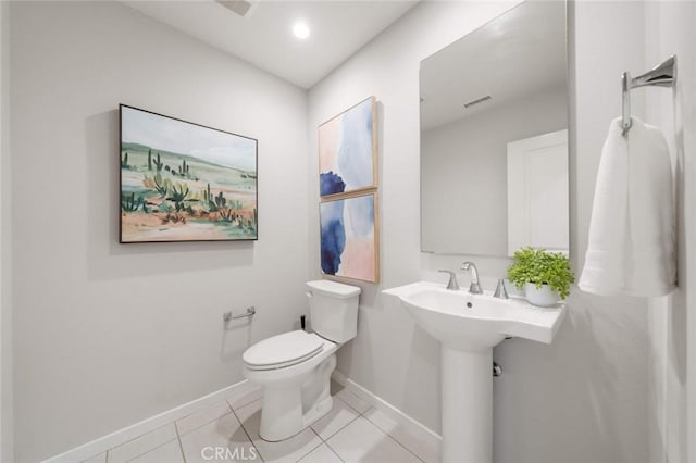 206 Milky Way, Irvine, CA 92618 - half bathroom featuring toilet, baseboards, and tile patterned floors