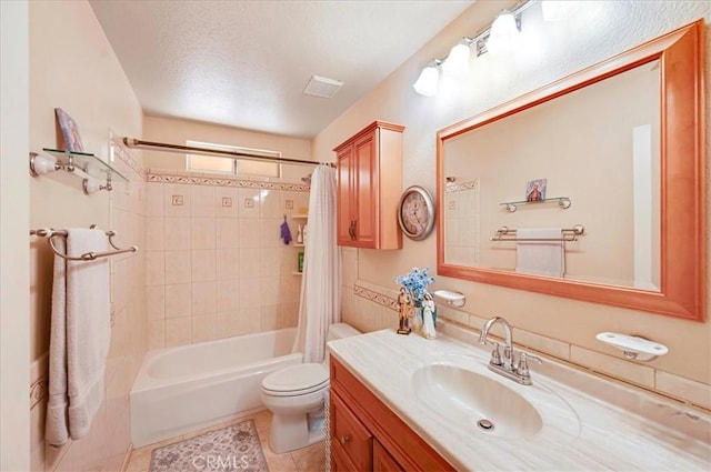 21332 Silver Spur Ln, Wildomar, CA 92595 - full bathroom with shower / tub combo with curtain, vanity, a textured ceiling, and tile patterned flooring